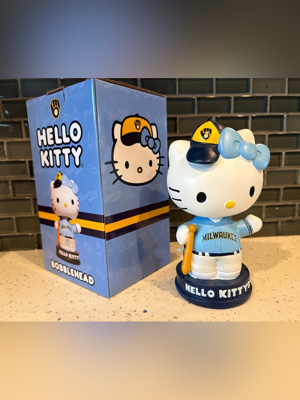 Hello Kitty Blue and Yellow Baseball Bobblehead Toy